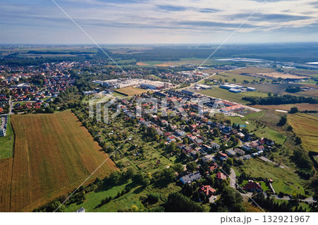 Aerial view of suburban area with residential houses and industrial zone 132921967