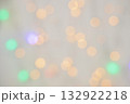 Blurred abstract sparkling multicolored garland background. Holiday backdrop. 132922218