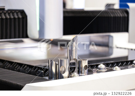 Metal product parts manufactured using a modern metalworking machine. CNC milling machine. International Metalworking Exhibition. Metal product parts manufactured using a modern metalworking machine. CNC milling machine. International Metalworking Exhibition. 132922226