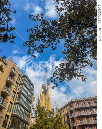 City Street View with La Sagrada de Familia Cathedral Towers and Residential Architecture 132922507
