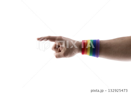Hand pointing with colorful rainbow LGBT wristband isolated on white background with clipping path Hand pointing with colorful rainbow LGBT wristband isolated on white background with clipping path 132925473