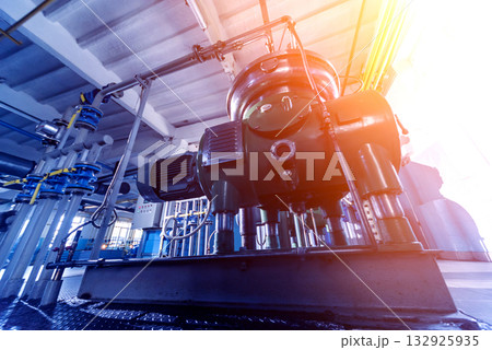 Interior of modern natural oil factory. The piping, pumps and motors Interior of modern natural oil factory. The piping, pumps and motors 132925935