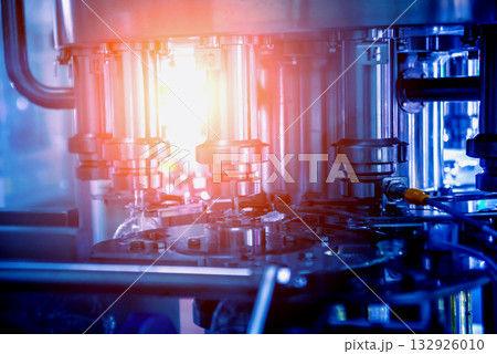 Bottling line of sunflower oil in bottles. Vegetable oil production plant.  132926010