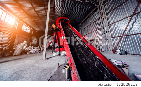 At modern recycling plant. Conveyor belt for transports garbage 132926218