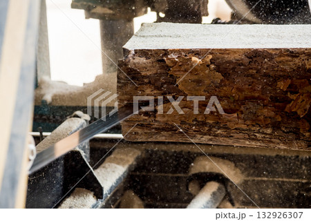 Modern sawmill. Industry sawing boards from logs Modern sawmill. Industry sawing boards from logs 132926307