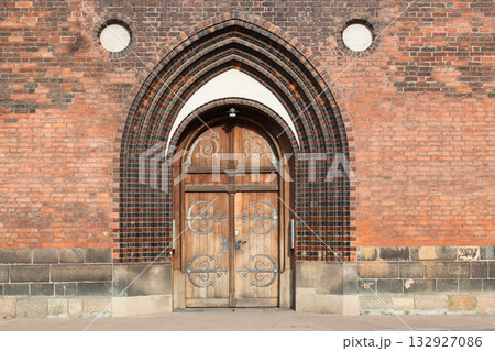 Entrance and portal of the cathedral of Aarhus in Denmark	 132927086