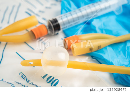 Foley urinary catheter with urine bag for disability or patient in hospital. 132928473