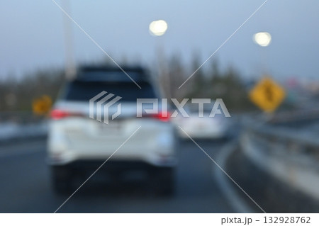 highway traffic with safety barrier on road asphalt, blurred image highway traffic with safety barrier on road asphalt, blurred image 132928762