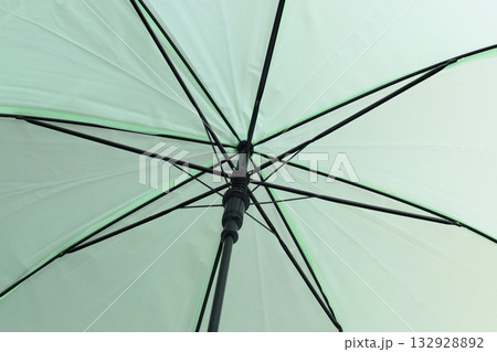surface of open green umbrella background 132928892