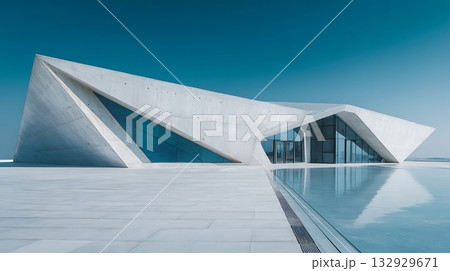 Modern Concrete Structure Reflecting in Water, Geometric Design, Azure Sky 132929671