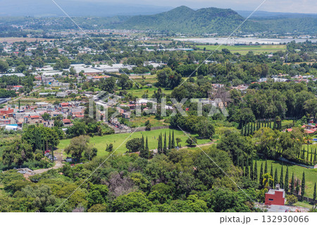 Scenic view of Atlixco Pueblo Magico in Puebla, Mexico a colorful colonial town with vibrant streets, mountains, and rich cultural heritage. Cultural tourism and travel concept Scenic view of Atlixco Pueblo Magico in Puebla, Mexico a colorful colonial town with vibrant streets, mountains, and rich cultural heritage. Cultural tourism and travel concept 132930066