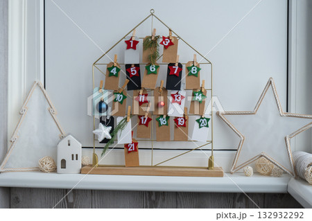 Traditional twenty four days advent calendar before Christmas holidays. Plastic free zero waste sustainable decoration. Winter cozy home Catholic traditions of Christmas countdown new year 132932292