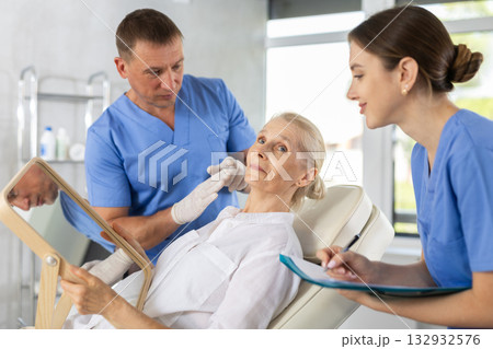 Attending medical consultation. Attending medical consultation. 132932576