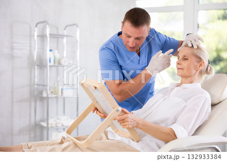 Attending medical consultation. 132933384