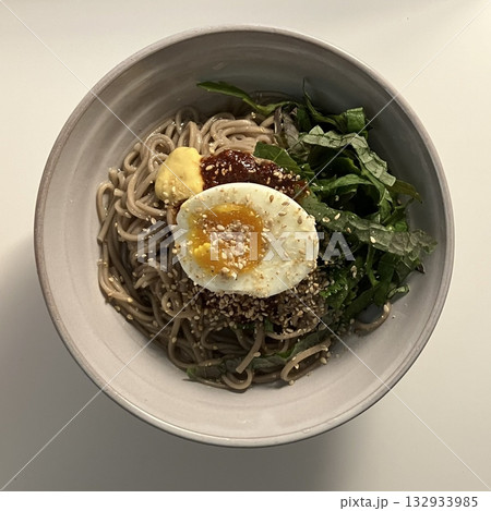 Memil Guksu, refreshing Korean buckwheat noodles served chilled with a tangy soy-based sauce, sesame seeds, and crisp vegetables. A light, healthy dish perfect for warm weather. Memil Guksu, refreshing Korean buckwheat noodles served chilled with a tangy soy-based sauce, sesame seeds, and crisp vegetables. A light, healthy dish perfect for warm weather. 132933985