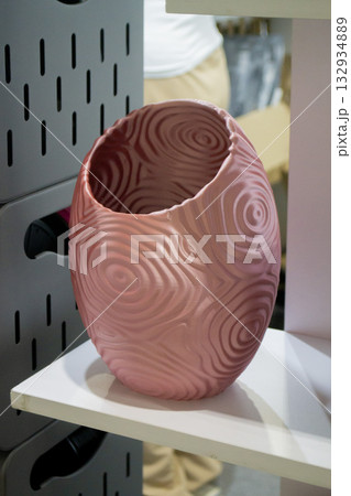 Object printed on 3D printer close up. Model printed on 3D printer from molten plastic. Vase printed on 3D printer from molten plastic of brown color. 3D printing technology. Additive FDM technologies 132934889