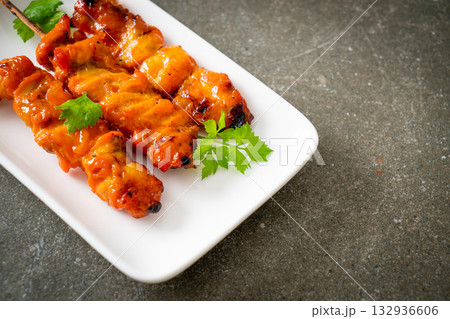 grilled chicken skewer with herbs and spices 132936606