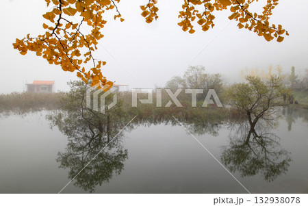 A dreamy morning at the foggy Mungwang Reservoir in Goesan-gun. A dreamy morning at the foggy Mungwang Reservoir in Goesan-gun. 132938078