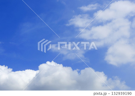 Blue sky with white fluffy clouds. Blue sky with white fluffy clouds. 132939190