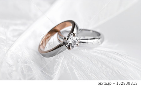 Golden wedding rings symbolize the couple's love and lifelong commitment to marriage Golden wedding rings symbolize the couple's love and lifelong commitment to marriage 132939815