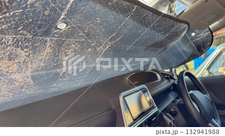 Foil sun visor for car windshield.  132941988