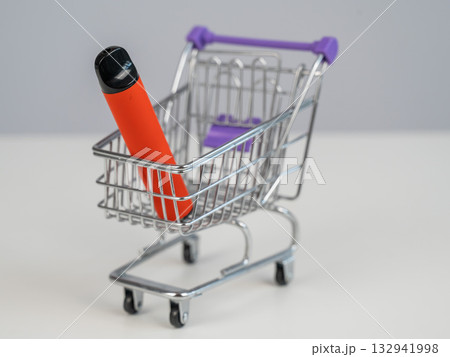 Disposable vape in a customer's cart. 132941998