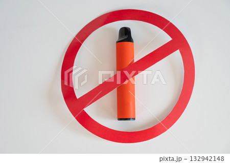 Prohibition sign on a disposable vape. Prohibition sign on a disposable vape. 132942148