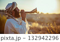 Jewish rabbi blows shofar. Yom Kippur.  132942296