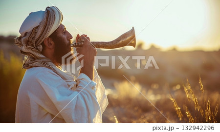Jewish rabbi blows shofar. Yom Kippur.  132942296