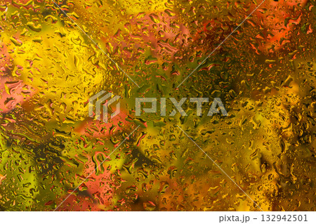 abstract background fall, glass drops autumn yellow leaves wet october weather 132942501