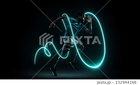 Sprinter running with glowing neon trail representing speed and motivation 132944166
