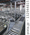packing line in a logistics warehouse. conveyor belt in a modern production line 132944815