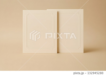 Minimal beige interior with two classic wall panels featuring decorative molding 132945280