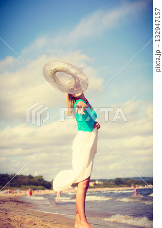 Attractive woman on the beach. Attractive woman on the beach. 132947157