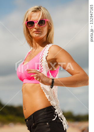 Pretty girl on beach. 132947165