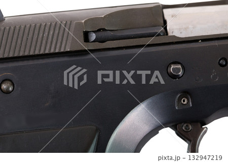 Close up of pistol slide with chamber detail 132947219