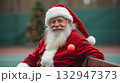 santa claus sit on bench with pickleball paddle 132947373