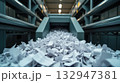 shredded document in industrial shredder 132947381