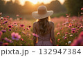 woman in a hat on lavender field 132947384