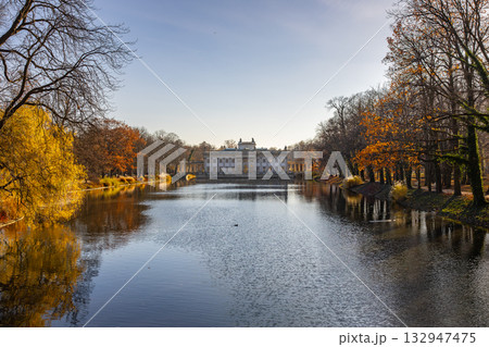 Royal Lazienki Palace on the Water in Warsaw during Autumn Reflections Royal Lazienki Palace on the Water in Warsaw during Autumn Reflections 132947475