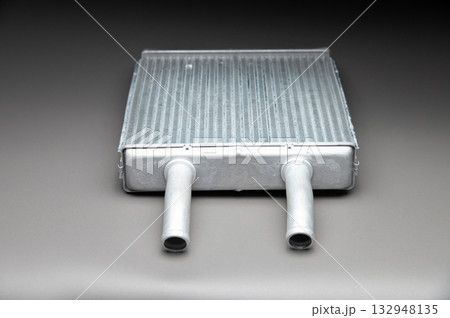 The radiator of the car interior heater. Auto spare parts The radiator of the car interior heater. Auto spare parts 132948135