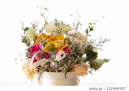 Colorful rose flower arrangement in a ceramic vase Colorful rose flower arrangement in a ceramic vase 132948507