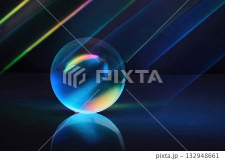 Luminous Sphere. A glowing sphere with colorful light beams on a dark backdrop, Luminous Sphere. A glowing sphere with colorful light beams on a dark backdrop, 132948661
