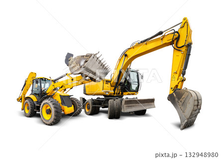 The excavator and loader are positioned in an isolated space, highlighting their design and colors against a clean background, ready for heavy-duty work. 132948980