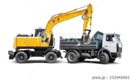 Heavy machinery stands ready for construction tasks, featuring a bright yellow excavator and a robust gray dump truck against a clear, isolated backdrop 132948981