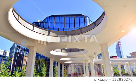 Exterior of modern high-rise buildings in a business district. Tall office buildings. Glass-fronted skyscrapers. Modern business district. 132950270