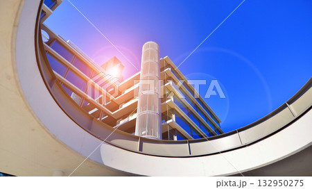 Exterior of modern high-rise buildings in a business district. Tall office buildings. Glass-fronted skyscrapers. Modern business district. 132950275