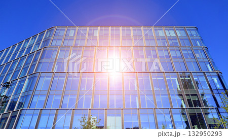 Exterior of modern high-rise buildings in a business district. Tall office buildings. Glass-fronted skyscrapers. Modern business district. 132950293