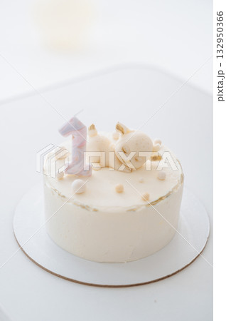 Cute birthday cake with number 1 candle, first birthday celebration 132950366