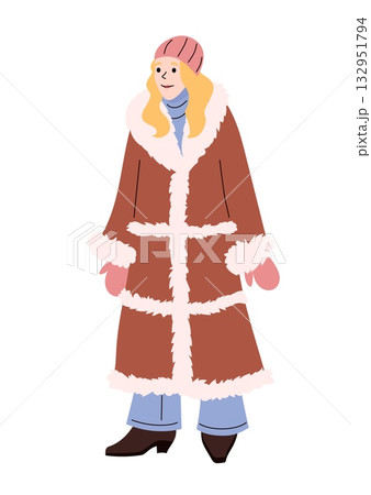 Smiling woman in long brown fur coat with mittens hat and boots dressed for cold winter weather 132951794